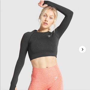 Gymshark long sleeve crop with thumb holes.
